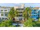 Amazing beach house surrounded by palm trees and lush greenery for a tropical vibe at 648 Beach Rd, Sarasota, FL 34242