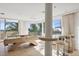 Entertainment room features a pool table, ocean views, and custom bar area at 648 Beach Rd, Sarasota, FL 34242