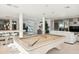 Game room with a pool table, bar area, comfortable seating, and stylish finishes at 648 Beach Rd, Sarasota, FL 34242