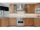 Well-equipped kitchen with stainless steel appliances, including a Viking range and hood at 648 Beach Rd, Sarasota, FL 34242
