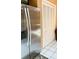 Kitchen with stainless steel refrigerator and pantry at 906 Tropical Dr, Bradenton, FL 34208