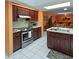 Well-equipped kitchen featuring stainless steel appliances at 906 Tropical Dr, Bradenton, FL 34208
