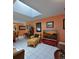 Comfortable living room boasts a large flat-screen TV and ample seating at 906 Tropical Dr, Bradenton, FL 34208