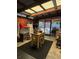 Indoor storage space featuring work tables and tools with a clear view of outdoor seating at 906 Tropical Dr, Bradenton, FL 34208