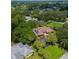 Aerial view showing home, yard, and neighborhood at 906 Tropical Dr, Bradenton, FL 34208