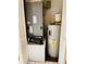 Interior shot of home's HVAC and water heater at 906 Tropical Dr, Bradenton, FL 34208
