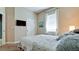 Bright bedroom with a queen bed and ample closet space at 924 Preservation St, Bradenton, FL 34208