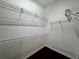 Large walk-in closet with wire shelving and hanging rods at 22105 Deer Pointe Xing, Bradenton, FL 34202