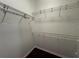 Spacious walk-in closet with wire shelving and hanging rods at 22105 Deer Pointe Xing, Bradenton, FL 34202