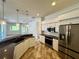 Modern kitchen featuring granite countertops and stainless steel appliances at 22105 Deer Pointe Xing, Bradenton, FL 34202
