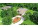 Aerial view of a luxurious estate with pool and landscaping at 22105 Deer Pointe Xing, Bradenton, FL 34202