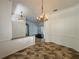Bright dining room with chandelier and tile floors at 22105 Deer Pointe Xing, Bradenton, FL 34202