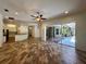 Open floor plan living room with pool access at 22105 Deer Pointe Xing, Bradenton, FL 34202