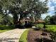 Luxury home exterior with driveway and landscaping at 22105 Deer Pointe Xing, Bradenton, FL 34202