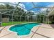 Large screened pool and patio with backyard view at 4925 70Th E St, Palmetto, FL 34221