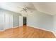 Hardwood floor bedroom with window and closet at 4925 70Th E St, Palmetto, FL 34221