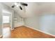 Bright bedroom with hardwood floors and built-in shelving at 4925 70Th E St, Palmetto, FL 34221