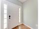 Entryway with wood flooring and a white door at 4925 70Th E St, Palmetto, FL 34221