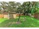 Backyard with playset and grassy area at 4925 70Th E St, Palmetto, FL 34221