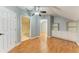 Bedroom with hardwood floors, ceiling fan, and en-suite bathroom at 4925 70Th E St, Palmetto, FL 34221