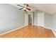 Spacious bedroom with wood flooring and ceiling fan at 4925 70Th E St, Palmetto, FL 34221