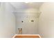 Laundry room with wire shelving and space for appliances at 4925 70Th E St, Palmetto, FL 34221