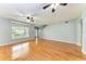 Bright living room with hardwood floors and ceiling fan at 4925 70Th E St, Palmetto, FL 34221