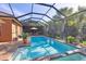 Screened pool and spa with ample deck space at 4625 Royal Dornoch Cir, Bradenton, FL 34211