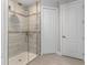 Spa-like shower with glass enclosure and tile surround at 8104 Bosco Rd, Port Charlotte, FL 33981