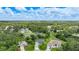 Scenic aerial view of multiple homes with mature trees at 2204 Chipley Ave, North Port, FL 34286