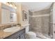 Clean bathroom with a large shower and granite vanity at 101 S Gulfstream Ave # 4A, Sarasota, FL 34236