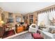 Home office featuring a large desk, comfortable chairs, and built-in shelving at 101 S Gulfstream Ave # 4A, Sarasota, FL 34236