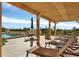 Relaxing pool area with lounge chairs and a pergola at 101 S Gulfstream Ave # 4A, Sarasota, FL 34236