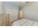 Bright bedroom with double doors and carpeted floor at 12198 Longview Lake Cir, Bradenton, FL 34211
