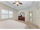 Main bedroom with large bed and plenty of closet space at 12198 Longview Lake Cir, Bradenton, FL 34211