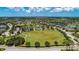 Aerial view of community park and surrounding houses at 12198 Longview Lake Cir, Bradenton, FL 34211