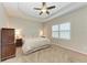 Spacious main bedroom with carpeted floor and large window at 12198 Longview Lake Cir, Bradenton, FL 34211
