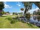 Private waterfront access with a dock for jet skis at 11213 Riverview Dr, Riverview, FL 33578