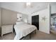 Guest bedroom with queen bed and double door closet at 2204 Chipley Ave, North Port, FL 34286