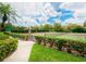 Well-maintained tennis courts with lush landscaping at 4068 Wilshire E Cir # 145, Sarasota, FL 34238