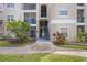 Condo exterior with walkway and staircase access at 5122 Northridge Rd # 107, Sarasota, FL 34238