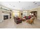 Community room with fireplace, comfortable seating, and kitchenette at 5122 Northridge Rd # 107, Sarasota, FL 34238