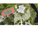 Aerial view of condo community with pool and tennis court at 5122 Northridge Rd # 107, Sarasota, FL 34238
