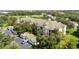 Multi-unit residential building with green roof and ample parking at 5122 Northridge Rd # 107, Sarasota, FL 34238