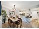 Dining room with granite topped table and kitchen view at 5122 Northridge Rd # 107, Sarasota, FL 34238
