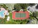 Community tennis court with surrounding landscaping at 5122 Northridge Rd # 107, Sarasota, FL 34238