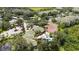 Aerial view of community with tennis court, pool, and landscaping at 5122 Northridge Rd # 107, Sarasota, FL 34238