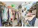 Large walk-in closet with ample hanging space and shelving at 5122 Northridge Rd # 107, Sarasota, FL 34238