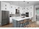 Spacious kitchen with stainless steel appliances and an island at 9949 Key Haven Rd, Seminole, FL 33777