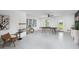 Fun game room with ping pong table, rod storage, and seating at 9957 Key Haven Rd, Seminole, FL 33777